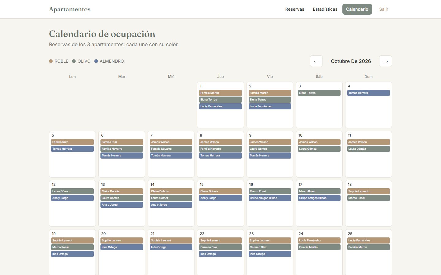 Calendario de ocupación con un color por apartamento (datos de ejemplo)